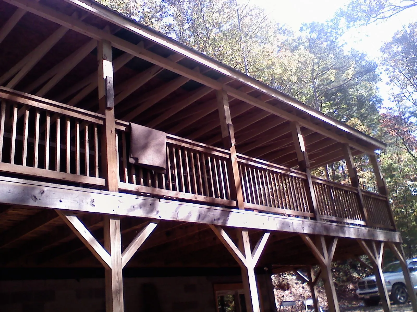 Timber framing under a new elevated porch and deck — Roof Leak Repair in Pierce by Roofing Brothers